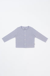 Flat lay of Avauma Haze Heart Cardigan in Soft Plume, lightweight baby cardigan with heart knit pattern and scalloped trim.